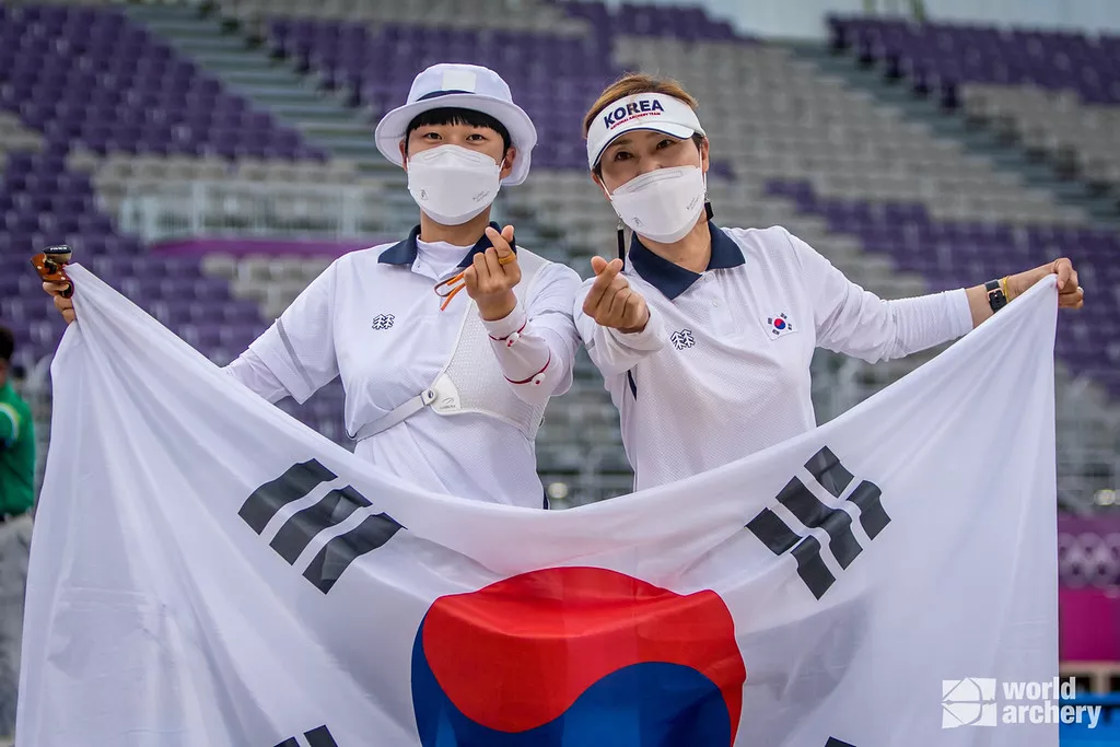 An San celebrates her third gold medal at the Tokyo 2020 Olympic Games. 
