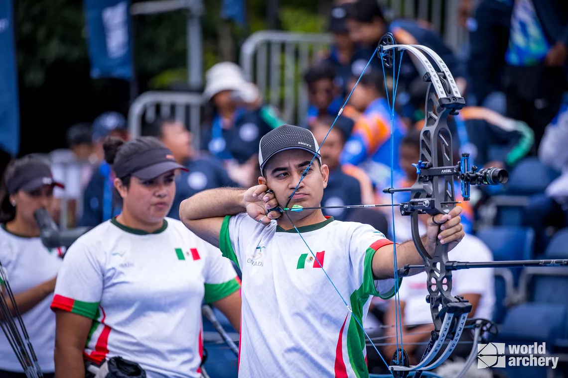 Andrea and Miguel Becerra win mixed team bronze at Shanghai 2023.