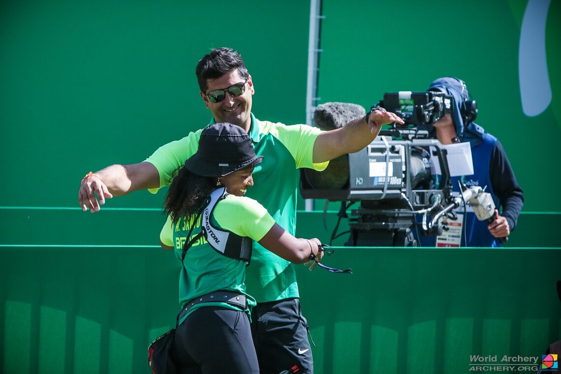 Ane Marcelle Dos Santos embraces her coach during the Olympic Games in 2016.