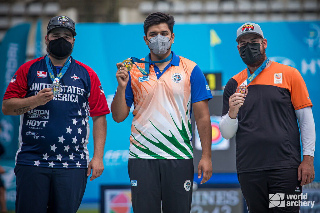 Mike Schloesser poses with his bronze medal at the third stage of the 2021 Hyundai Archery World Cup in Paris, France. 