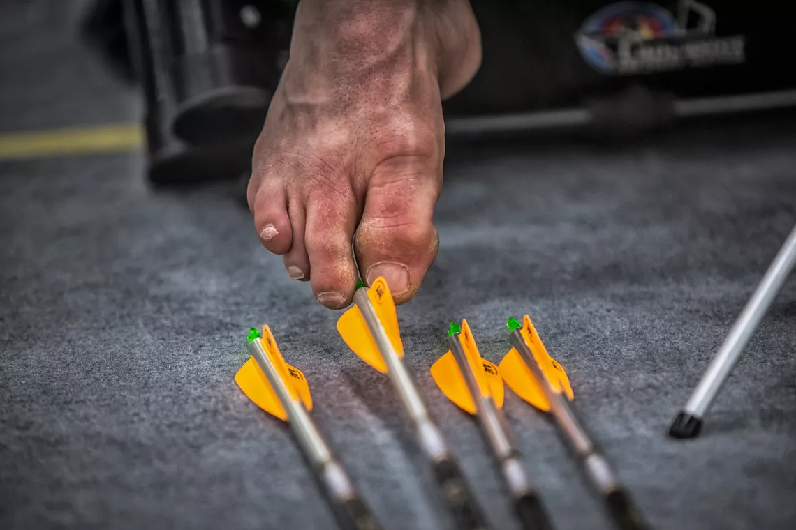 Matt Stutzman selecting an arrow during the Vegas Shoot.