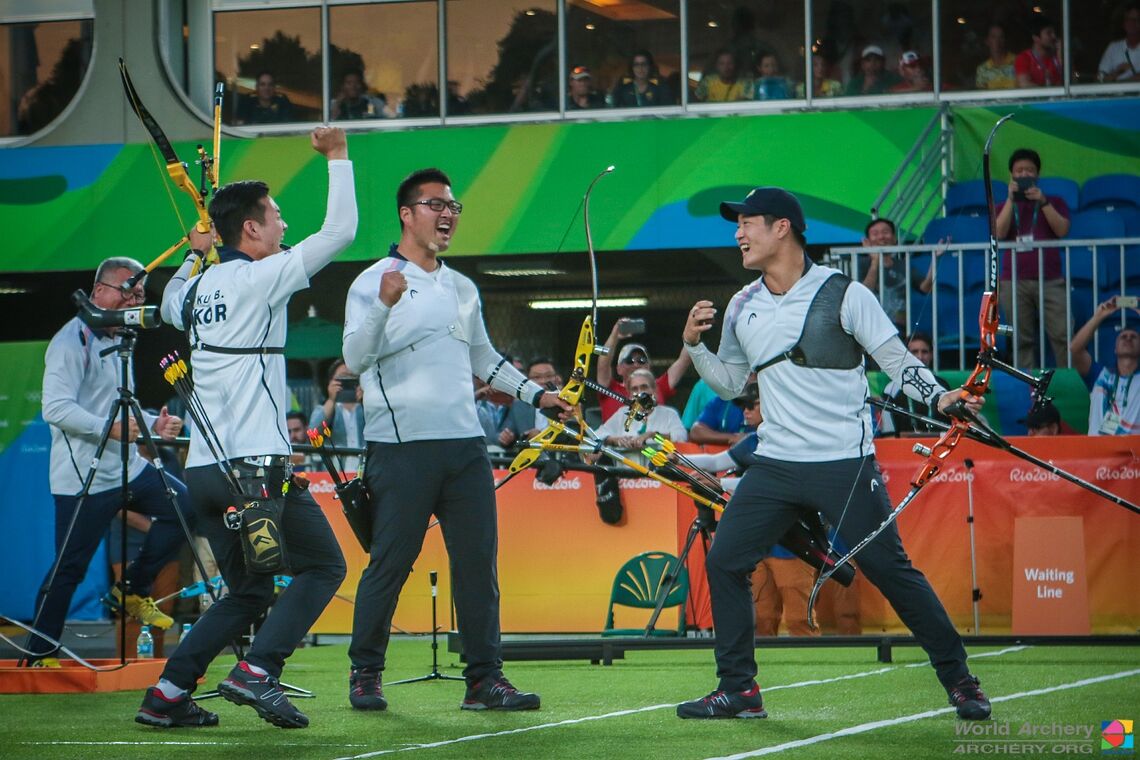 The Korean recurve men’s team celebrates winning the Rio 2016 Olympic Games.