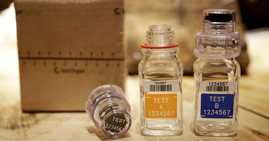 Picture of doping test containers.
