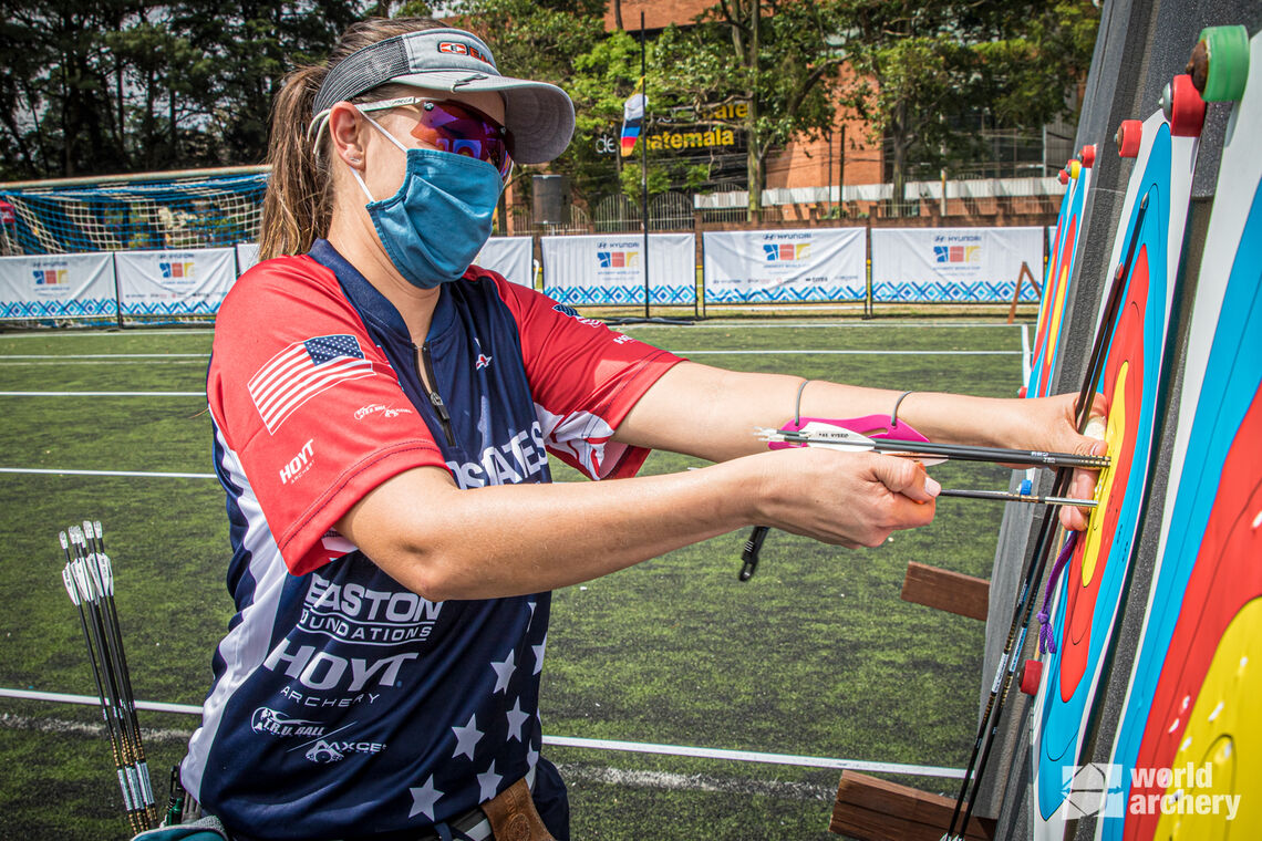 Linda Ochoa-Anderson pulls arrows during practice at the first stage of the 2021 Hyundai Archery World Cup in Guatemala City.