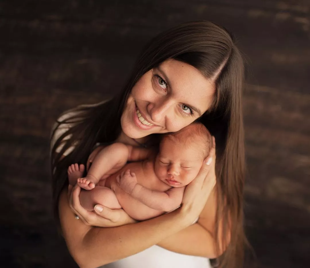 Toja Ellison and baby son, Ty.