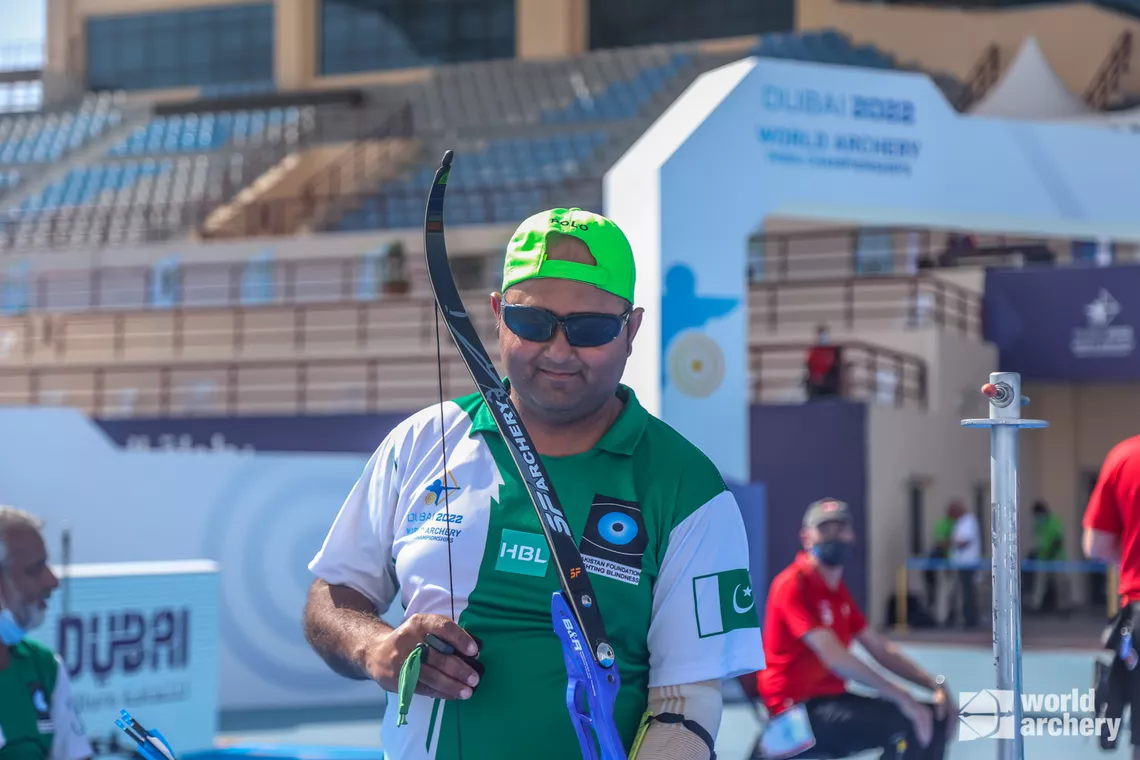 Pakistan's Tanveer Ahmed smiles to camera at Dubai 2022