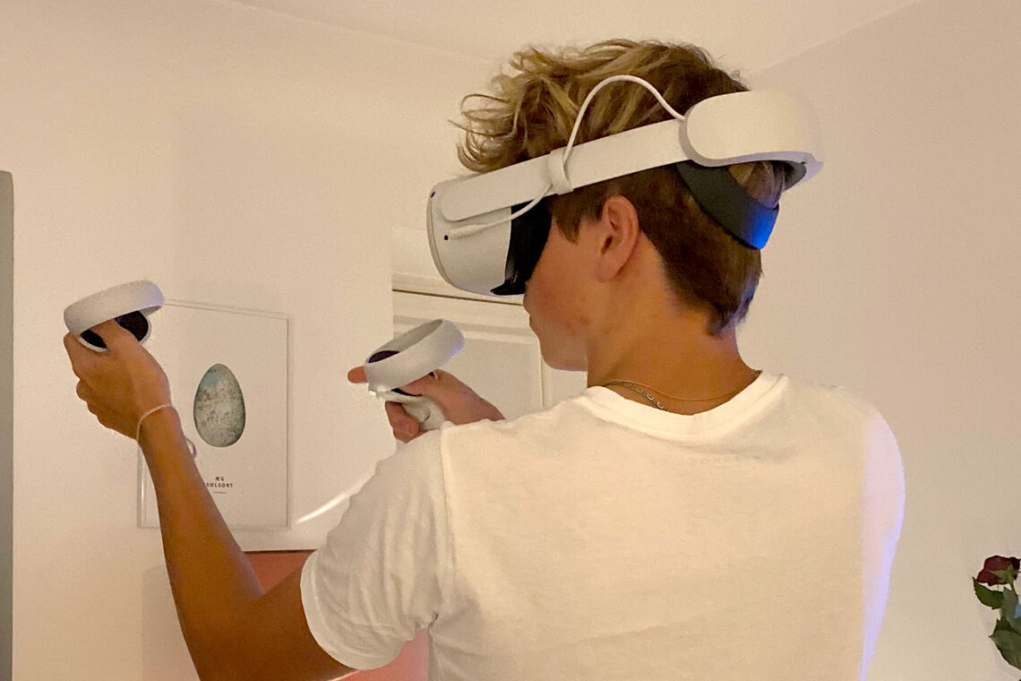 Fullerton playing a virtual reality game