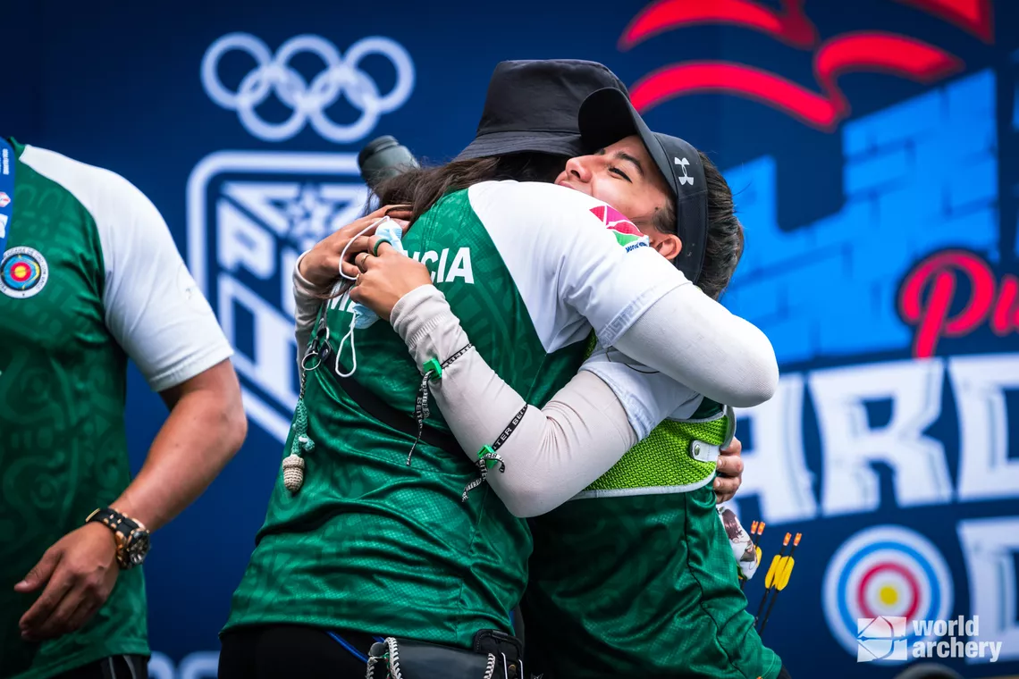 Valencia and Vazquez hug after their final in Puerto Rico.