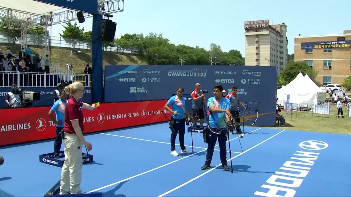 The judge shows Verma the yellow card to issue the time penalty.