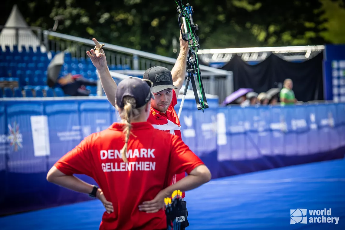 Stephan Hansen raised his hands in celebration before his arrow had landed.
