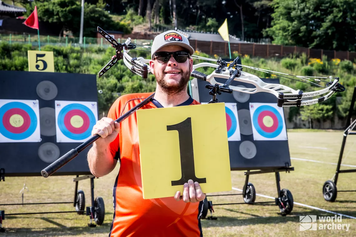 Mike Schloesser at Gwangju 2022 with #1 sign