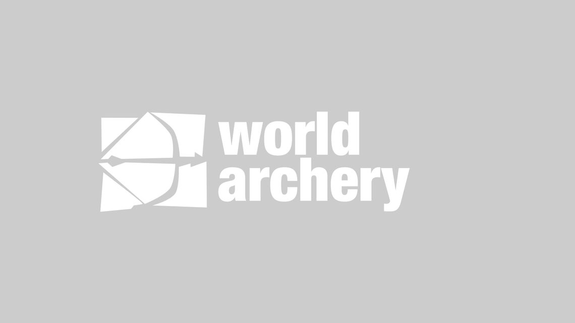 World Archery logo on grey background.
