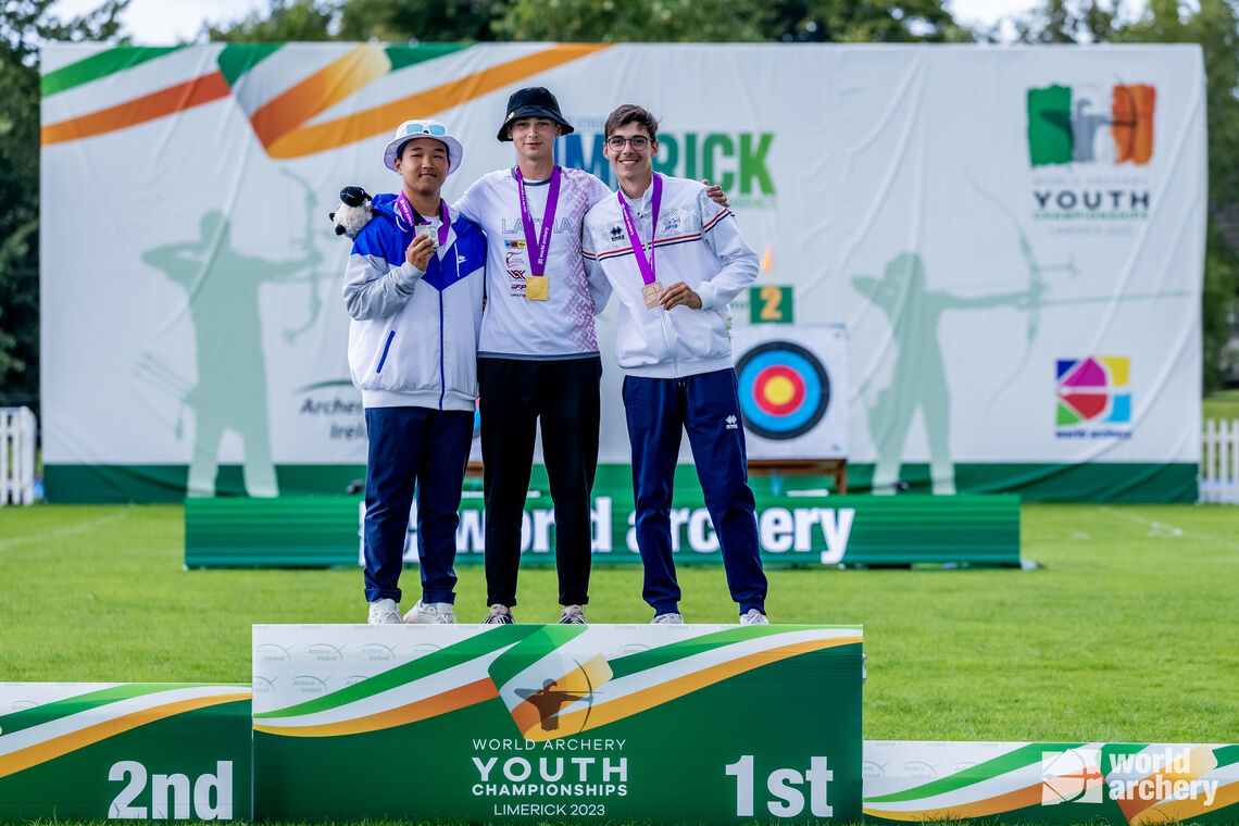 Choi Chuljun, Romans Sergejevs and Baptiste Addis on recurve under-18 men’s podium.