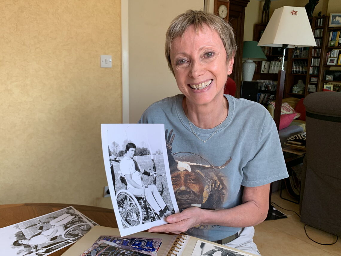 Corinne Musy with a picture of her father Maurice Musy, Paralympic Champion in 1968.