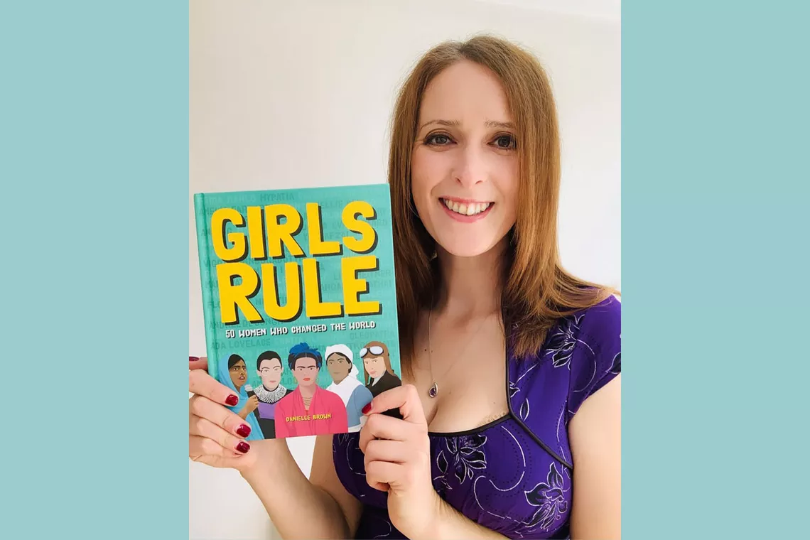 Danielle Brown with one of her books.