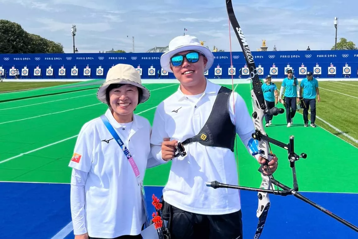 Coach Sally with Bhutan’s only archer at Paris 2024, Lam Dhorji.