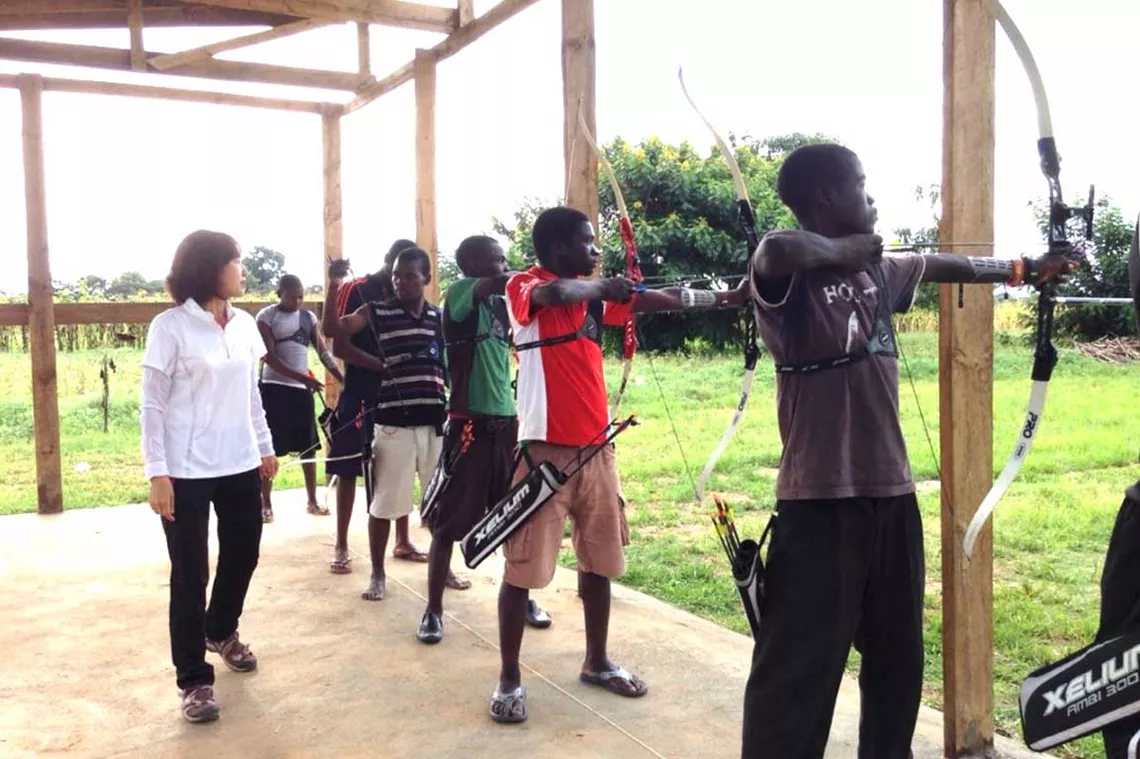 Sally coaching archers in Gumulira, Malawi.