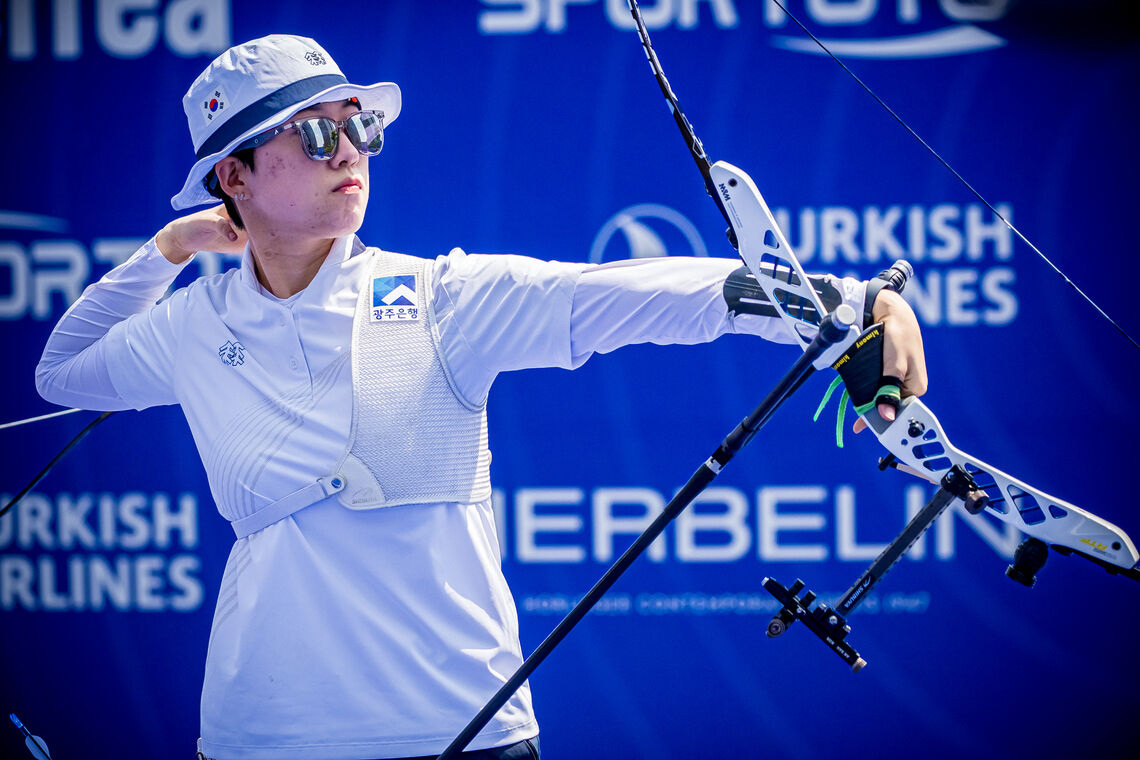 An San just after releasing an arrow.