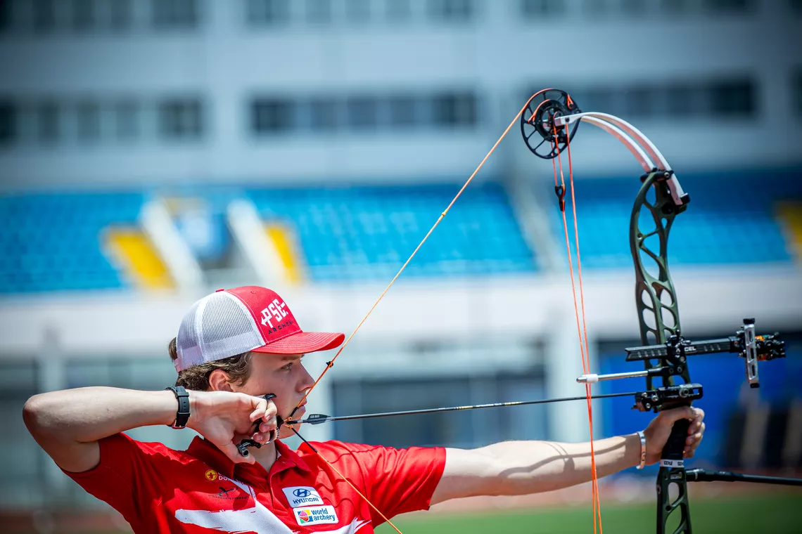Mathias Fullerton aiming.