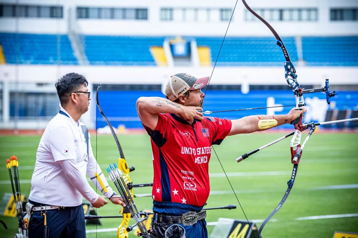Brady Ellison and Kim Woojin facing in Shanghai 2025 in the recurve men’s team semifinal.