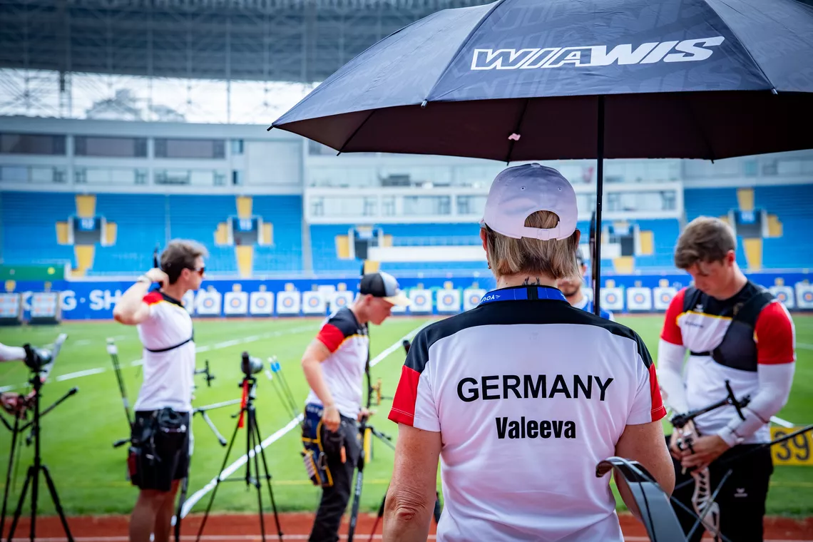 Natalia Valeeva watching German archers at Shanghai 2025.