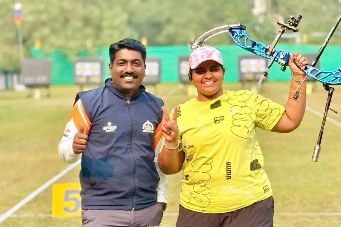 Madhura Dhamangaonkar with coach Pravin Sawant.