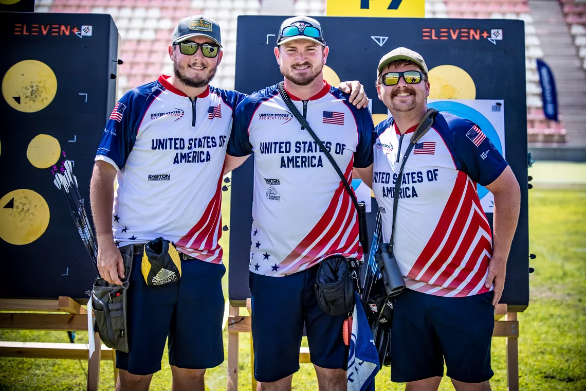 Jesse Clayton with Curtis Broadnax and James Lutz after winning compound men's team bronze at Madrid