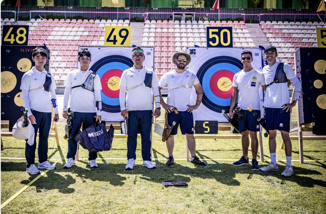 France and Korea men's teams at the targets following their semifinal match.