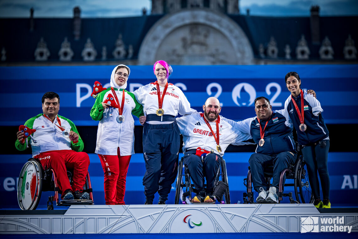 Sheetal Devi and Rakesh Kumar on the Paris 2024 Paralympic Games podium.