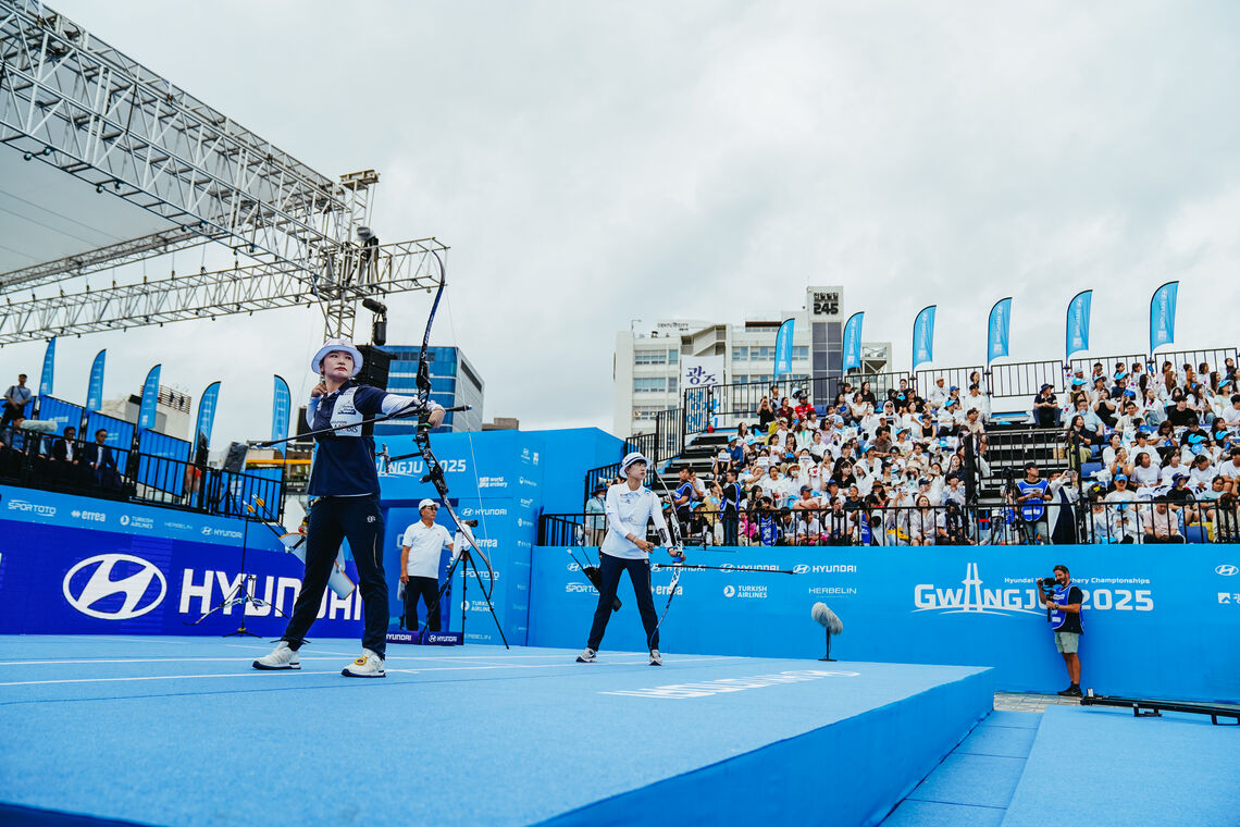 Kang Chaeyoung and An San on the shooting line at 5.18 Democracy Square.