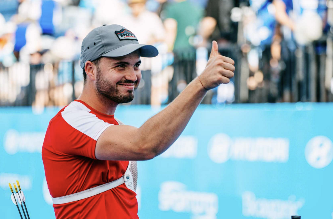 Andres Temino Mediel giving a thumbs up to the crowd.