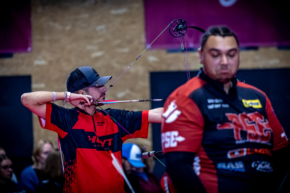 Nicolas Girard shooting the background as Ajay Scott pulls a funny face.