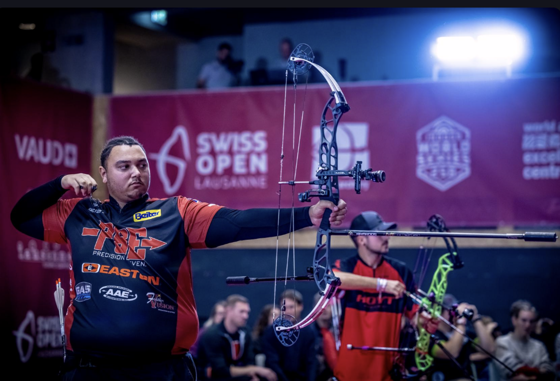 Ajay Scott shooting in the Lausanne final.