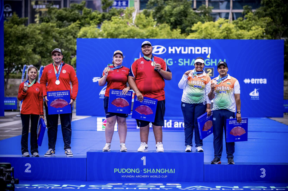 Ajay Scott and Ella Gibson on the top podium in Shanghai.