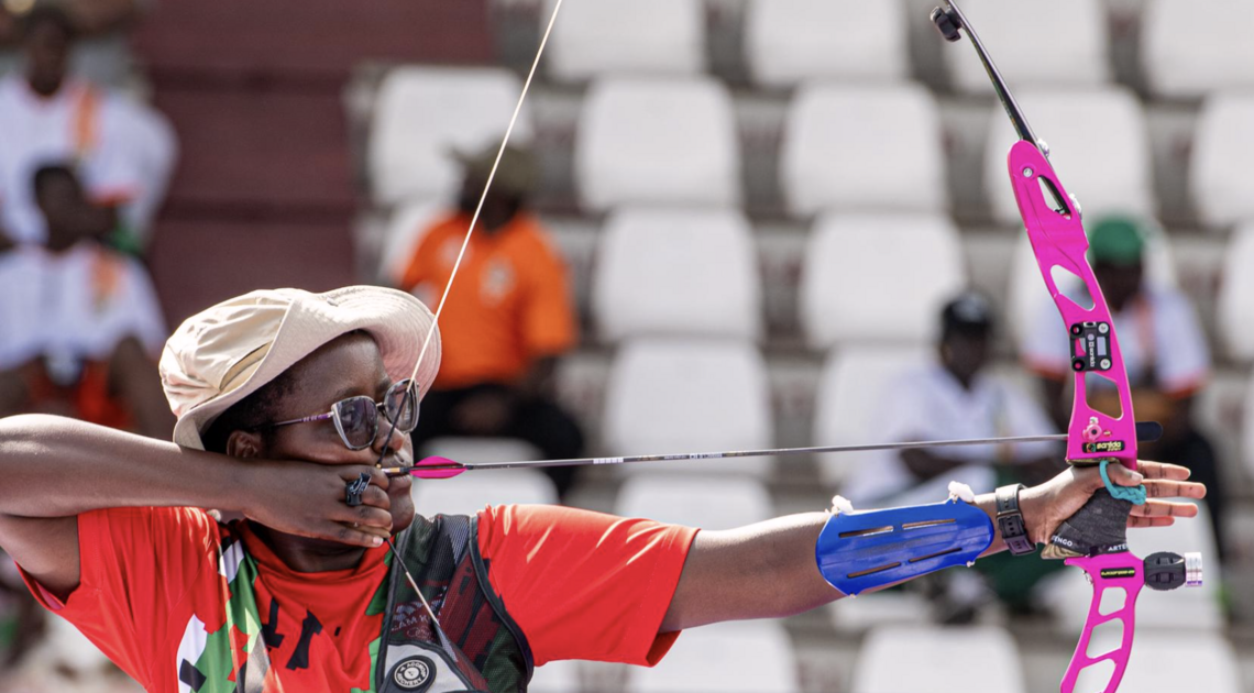 Gloria Kitali aiming in the Barebow Women final.