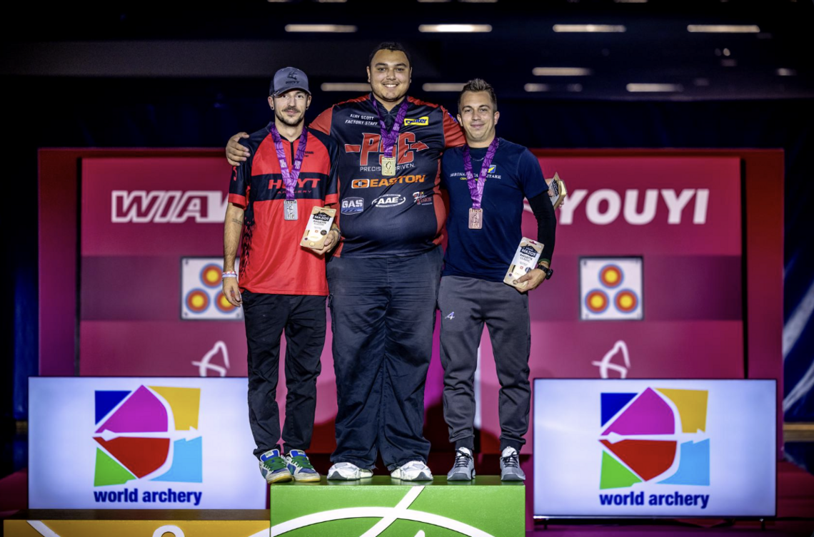 Marco Morello on the podium in Lausanne with gold medallist Ajay Scott and silver medallist Nicolas Girard.