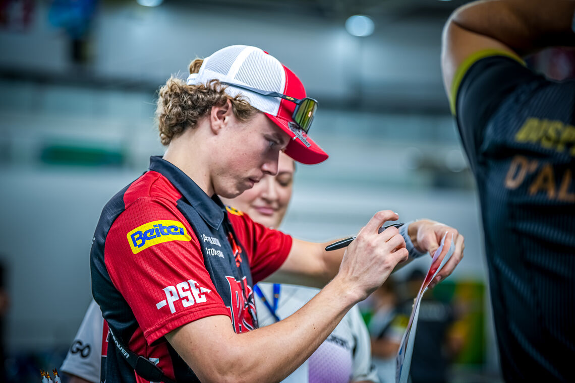 Mathias Fullerton signing a target.