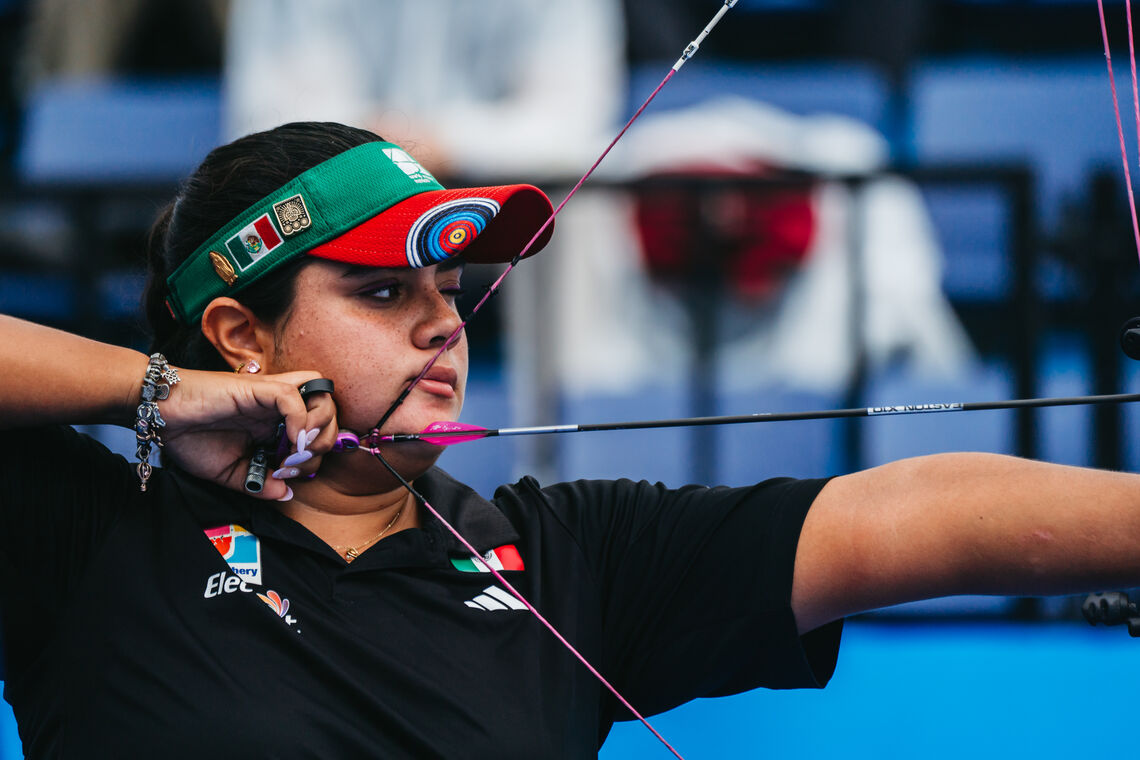 Andrea Becerra aiming. 