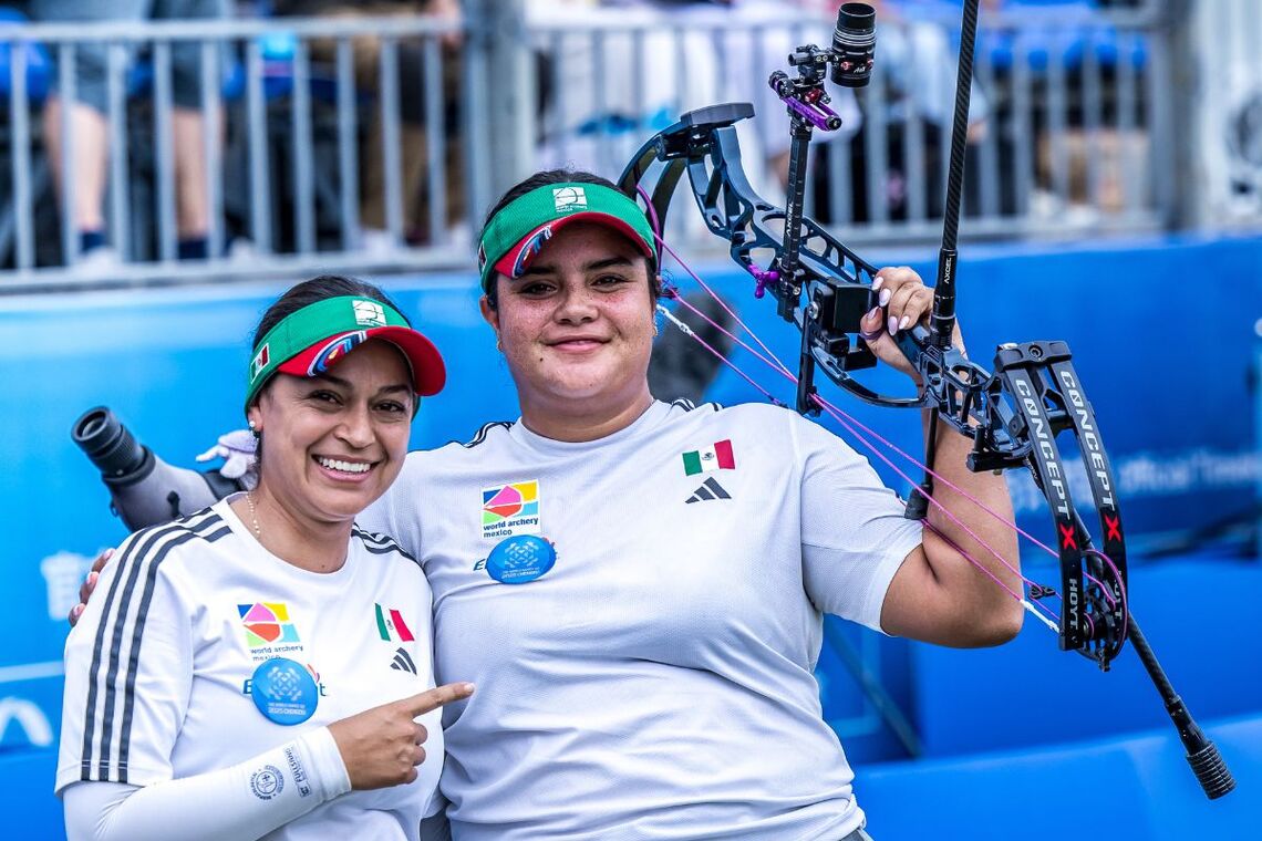 Andrea Becerra with coach Karan Montellano at Chengdu 2025 World Games.