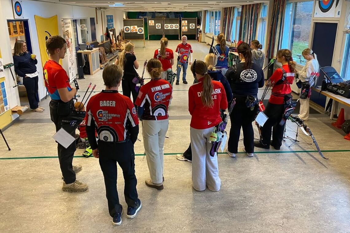 Jens Fudge instructing archers for practicing finals rounds shooting.