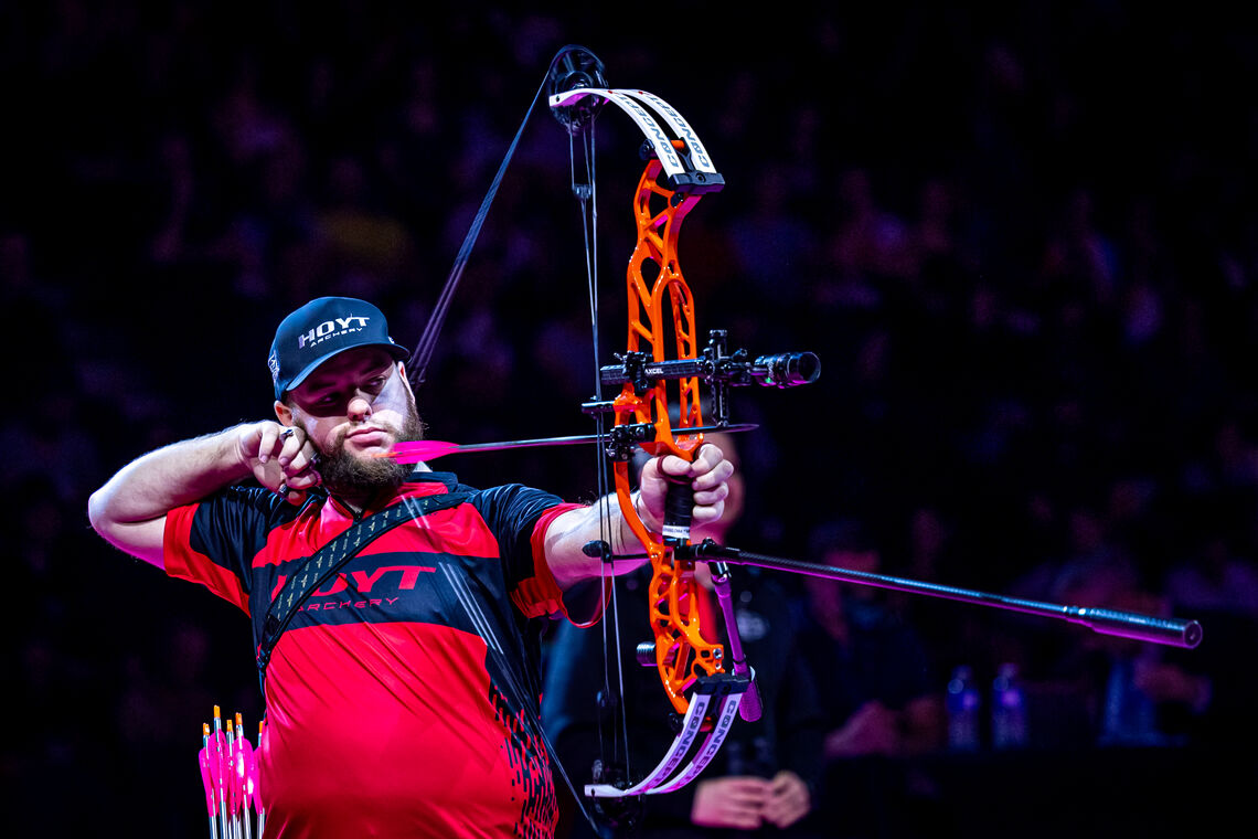 Mike Schloesser shooting at Nimes 2026 indoor tournament.