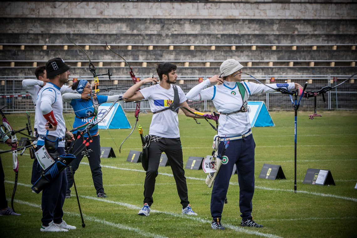 Dan Olaru shooting mixed team at Berlin 2019 Hyundai Archery World Cup.