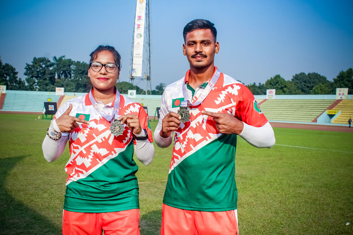 Bonna Akter and Himu Bachhar won silver at the Dhaka 2025 Asian Archery Championships.