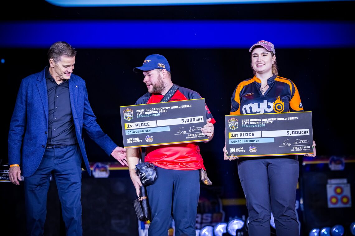 Archers pose with awards