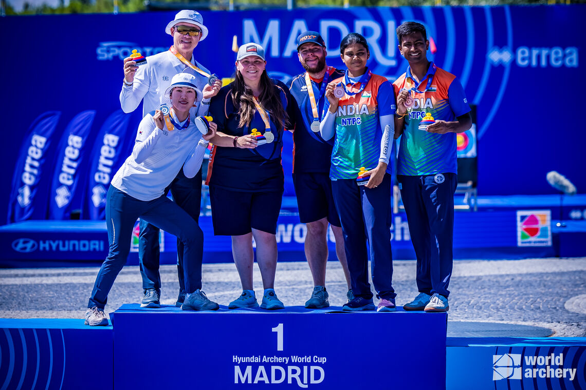 Rishabh Yadav and Jyothi Surekha Vennam on the podium at the Madrid 2025 Hyundai Archery World Cup.