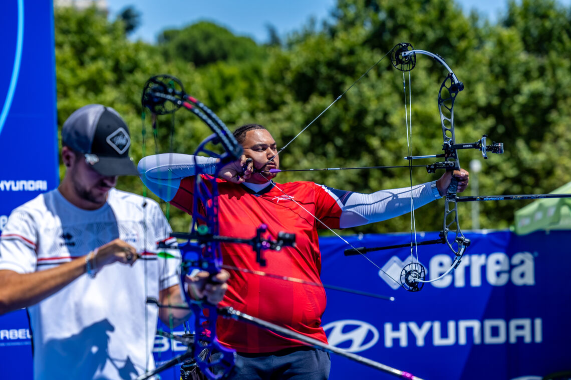 Ajay Scott shooting against Nicolas Girard at the Madrid 2025 World Cup.