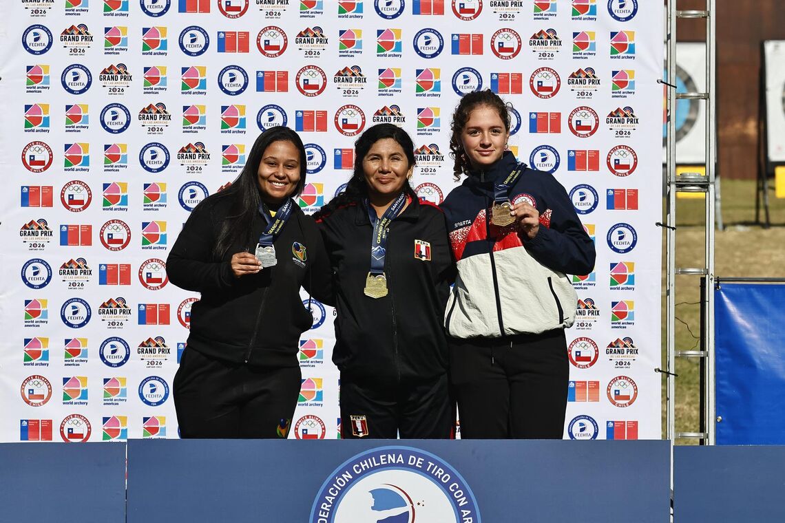 Archers pose with an award