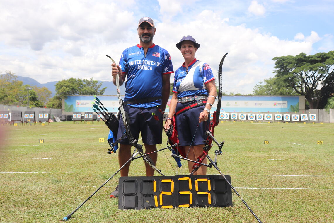 Mark Williams and Janis Grellner pose after setting a world record