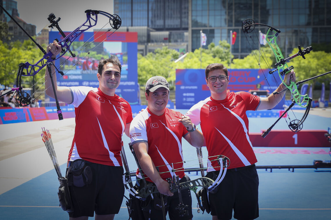 Archers pose after their win