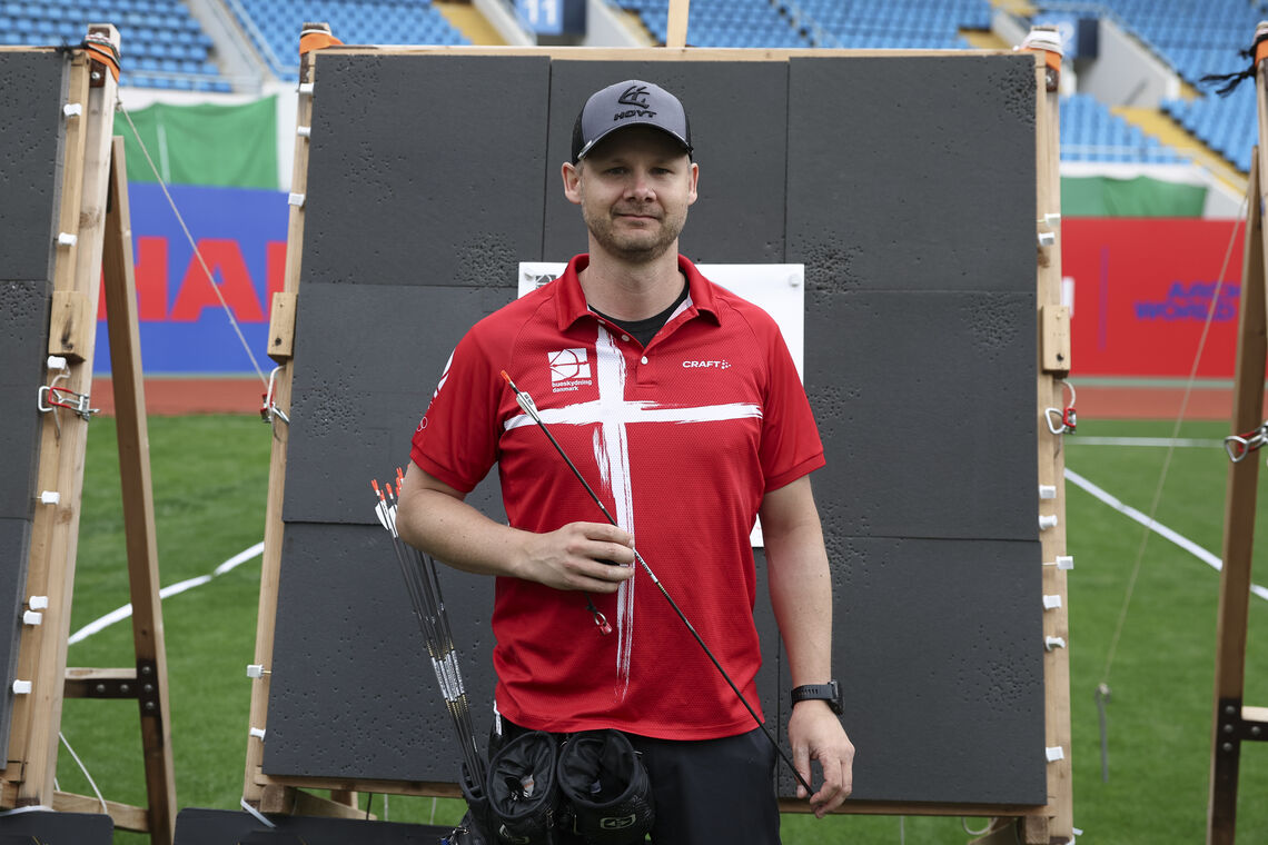 Martin Damsbo posting at the target after winning his quarterfinal at Shanghai 2026.